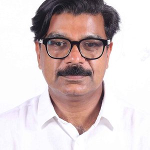 DR. MATHEW KUZHALNADAN